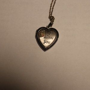 "I Love You" hear shaped locket with black hills gold/tri-colored